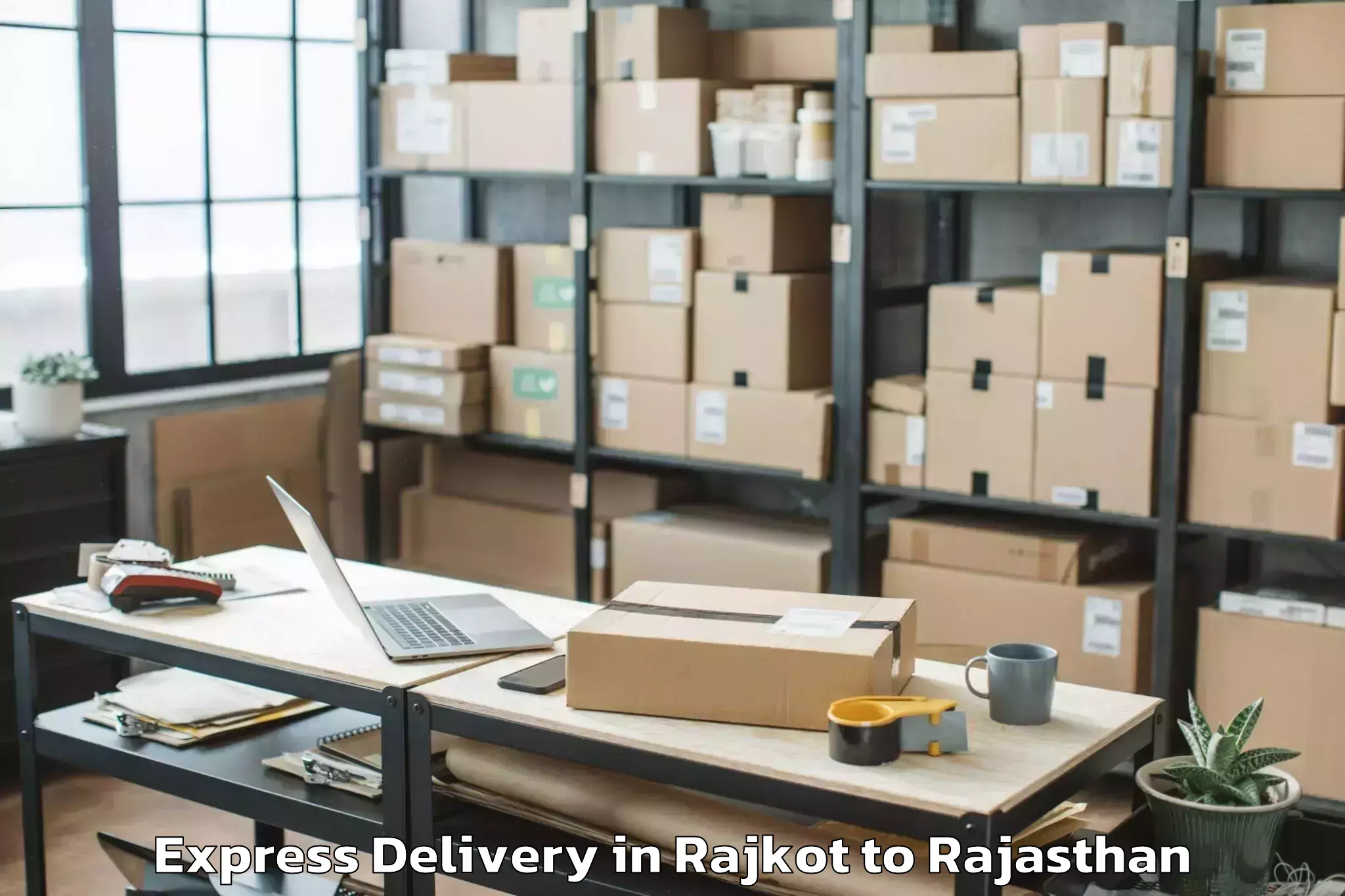 Professional Rajkot to Dholpur Express Delivery